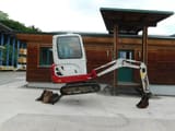 2015 Takeuchi TB216 mini excavator side view