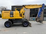 2018 Komatsu PW180-10 wheel excavator, side profile view