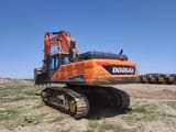 Doosan DX520LC-9C crawler excavator, rear three-quarter view