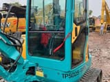 Kubota KX135 mini excavator, side view of the cab