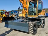 2014 Hyundai R140W-9 wheel excavator, front three-quarter view