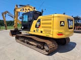 2018 Caterpillar 320 crawler excavator, rear three-quarter view
