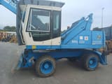 2003 Fuchs MHL320 wheel excavator, side view