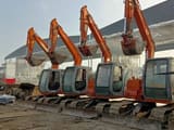 2008 Hitachi EX60-5 mini excavators in a row