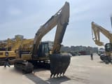2024 Caterpillar 323 crawler excavator, front three-quarter view