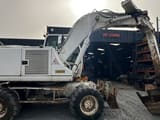 2005 CASE WX165 wheel excavator, side profile view