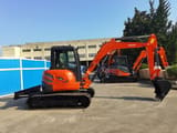 2023 Kubota KX155-5 mini excavator, side view
