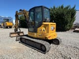 2023 Caterpillar 305 CR crawler excavator, rear three-quarter view