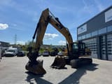 2011 Caterpillar 324D crawler excavator, side view
