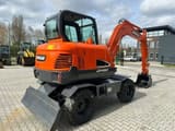 2018 Doosan DX60 wheel excavator, rear three-quarter view