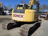 2006 New Holland E135SR-1E crawler excavator, rear three-quarter view