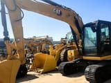 2022 Caterpillar 312D2 crawler excavator side view
