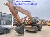 2022 Hyundai R210W-9 wheel excavator, front three-quarter view