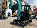 2023 Kobelco SK55SR mini excavator, front three-quarter view