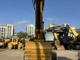 2024 Caterpillar 325D crawler excavator, front view of bucket and boom