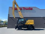2022 Caterpillar MH3040 material handler side view