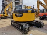 2022 Komatsu PC128US mini excavator, rear three-quarter view