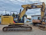 2012 Caterpillar 324E crawler excavator, side profile view