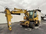 1997 CASE 788-PRR wheel excavator, side profile view