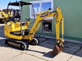 2002 Komatsu PC12R-8 mini excavator, side view