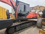 2024 Doosan DX225LCA crawler excavator side view
