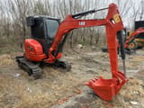 2022 Kubota U35 mini excavator, side view