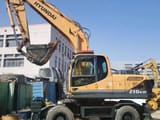 2016 Hyundai 210W-9T wheel excavator side view