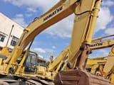 2024 Komatsu PC360-7 crawler excavator, side view of boom and cab