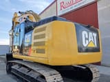 2015 Caterpillar 329E crawler excavator, rear three-quarter view