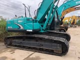 2024 Kobelco SK210 crawler excavator, side profile view