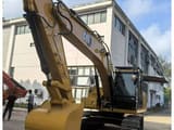 2022 Caterpillar 320GX crawler excavator, front three-quarter view