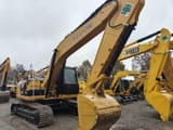 2025 Caterpillar 320D2 Raupenbagger, Front-Dreiviertelansicht