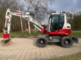 2020 Takeuchi TB295W wheel excavator, side view