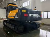 2020 Hyundai HX305-HD crawler excavator, rear three-quarter view