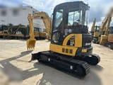 2016 Komatsu PC55MR-2 mini excavator, rear three-quarter view
