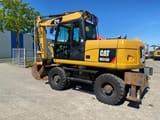 2014 Caterpillar M313D wheel excavator side view