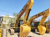 2023 Caterpillar 330D crawler excavator, front three-quarter view