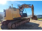 2014 Caterpillar 320E crawler excavator, rear three-quarter view