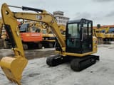 2022 Caterpillar 306E2 mini excavator, front three-quarter view