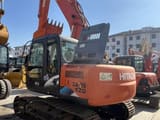 2022 Hitachi Zaxis 120 crawler excavator, rear three-quarter view