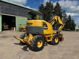 2013 Komatsu PW98MR-8 wheel excavator, rear three-quarter view