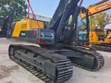 2024 Volvo EC210D crawler excavator, rear three-quarter view