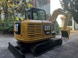 2020 Caterpillar 306E2 mini excavator, rear three-quarter view