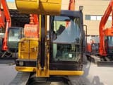 2024 Caterpillar 305.5E2 mini excavator, front view