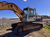 1994 Komatsu PC210-5 excavator side view