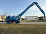 2000 Terex Fuchs MHL 360 material handler, side profile view