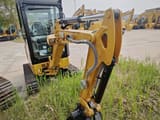 2026 Caterpillar 302CR mini excavator boom and cab view