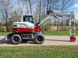 2015 Takeuchi TB295W wheel excavator, side view