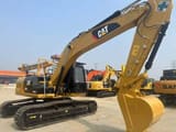 2020 Caterpillar 323DL crawler excavator, side view