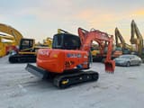2024 Hitachi Zaxis 70 excavator, rear three-quarter view